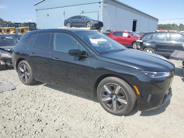 WB523CF06SCS98463 - 2025 BMW IX XDRIVE50 BLACK photo 4