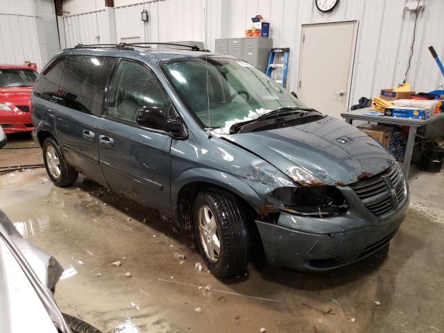 1D4GP45RX5B416595 - 2005 DODGE CARAVAN SXT GREEN photo 4