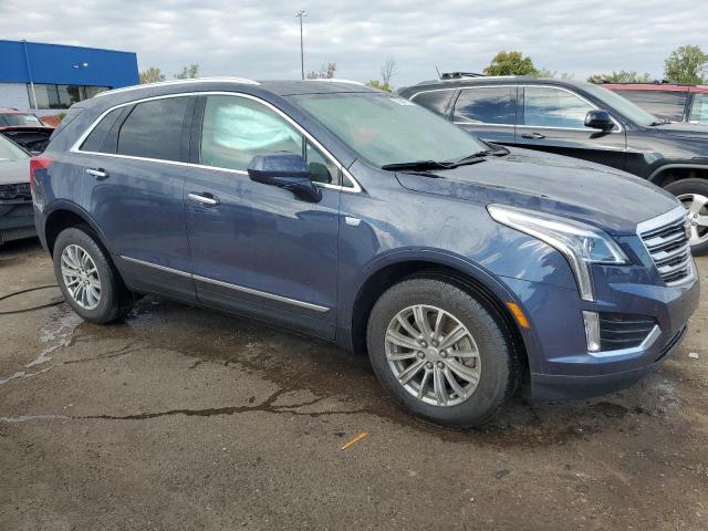 1GYKNDRS8KZ179046 - 2019 CADILLAC XT5 LUXURY BLUE photo 4