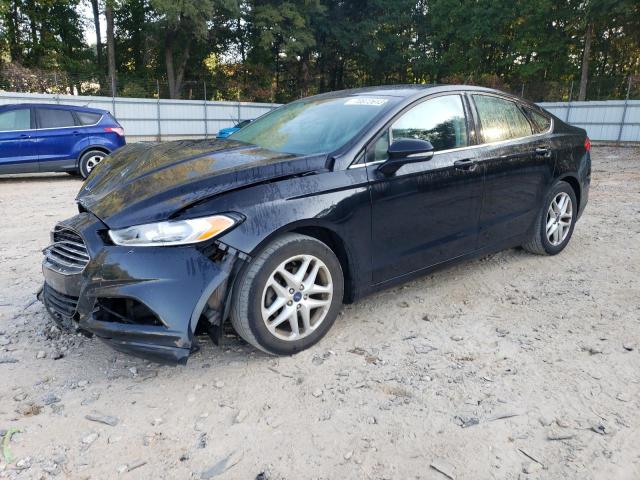 3FA6P0HD6GR394312 - 2016 FORD FUSION SE BLACK photo 1