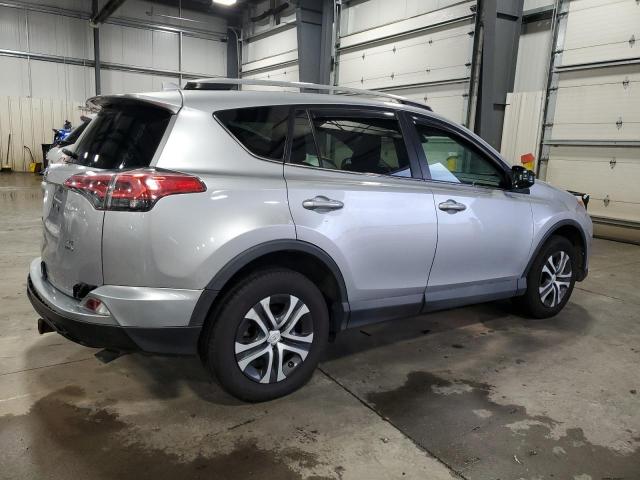 2T3BFREV6HW594200 - 2017 TOYOTA RAV4 LE SILVER photo 3