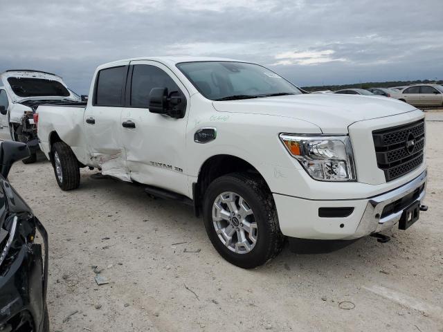 1N6AA1FB7PN109243 - 2023 NISSAN TITAN XD SV WHITE photo 4