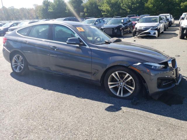 WBA8Z9C51JG828682 - 2018 BMW 330 XIGT GRAY photo 4