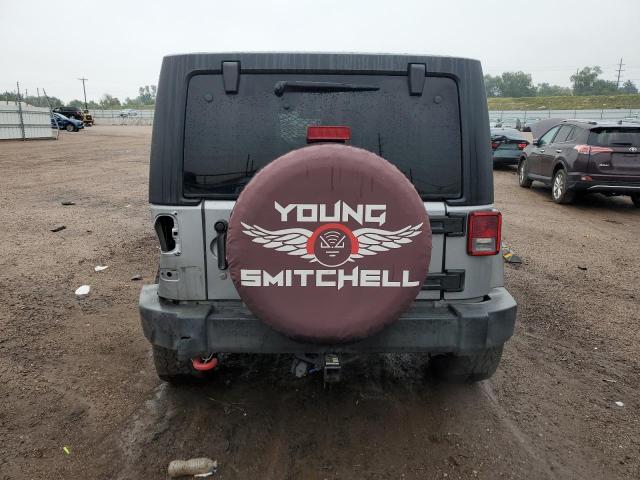 1C4BJWDG8EL145342 - 2014 JEEP WRANGLER U SPORT Серебристый фото 6