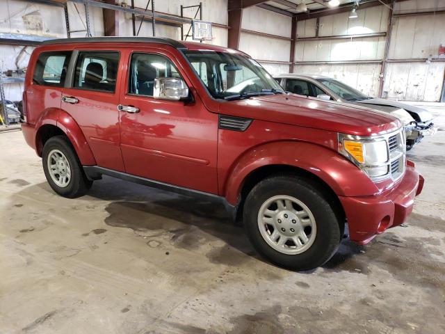 1D4PU2GK4BW535650 - 2011 DODGE NITRO SE MAROON photo 4