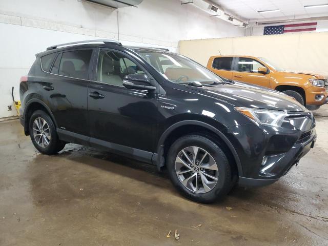 JTMRJREV6JD186070 - 2018 TOYOTA RAV4 HV LE BLACK photo 4