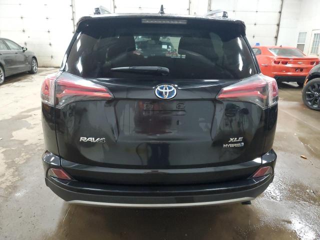 JTMRJREV6JD186070 - 2018 TOYOTA RAV4 HV LE BLACK photo 6