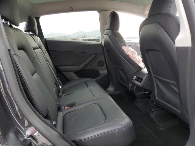 7SAYGDED7SF317637 - 2025 TESLA MODEL Y გრაფიტი ფოტო 11