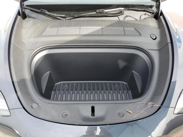 7SAYGDED7SF317637 - 2025 TESLA MODEL Y გრაფიტი ფოტო 12