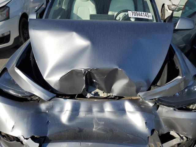 7SAYGDEF7RA288973 - 2024 TESLA MODEL Y GRAY photo 11