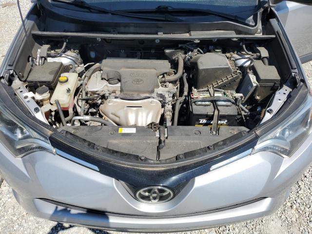 2T3ZFREV5HW386209 - 2017 TOYOTA RAV4 LE SILVER photo 12