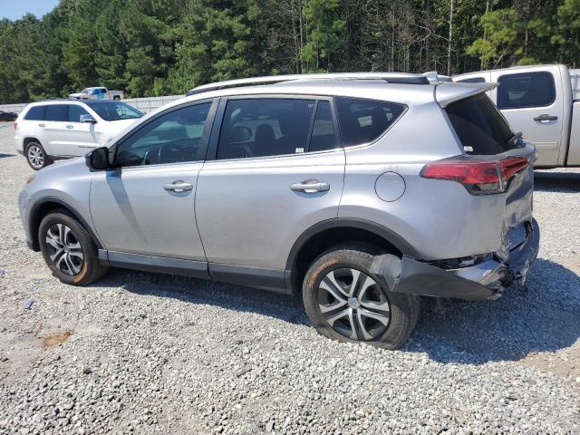 2T3ZFREV5HW386209 - 2017 TOYOTA RAV4 LE SILVER photo 2