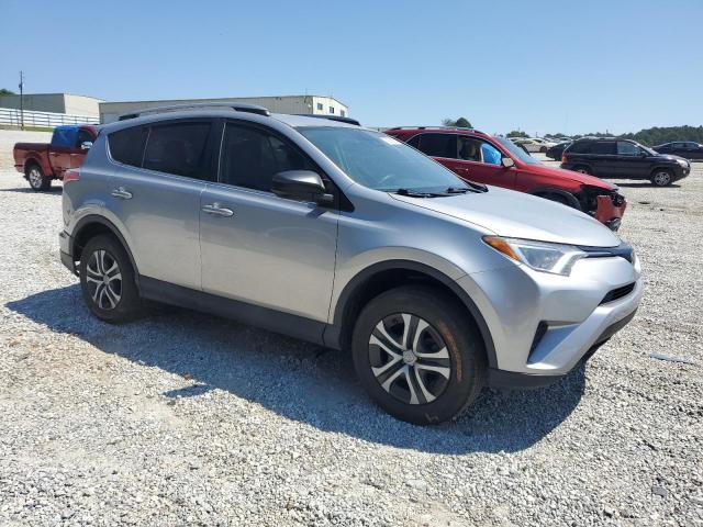 2T3ZFREV5HW386209 - 2017 TOYOTA RAV4 LE SILVER photo 4