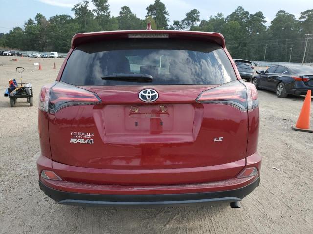 2T3ZFREV2JW425912 - 2018 TOYOTA RAV4 LE أحمر صورة 6