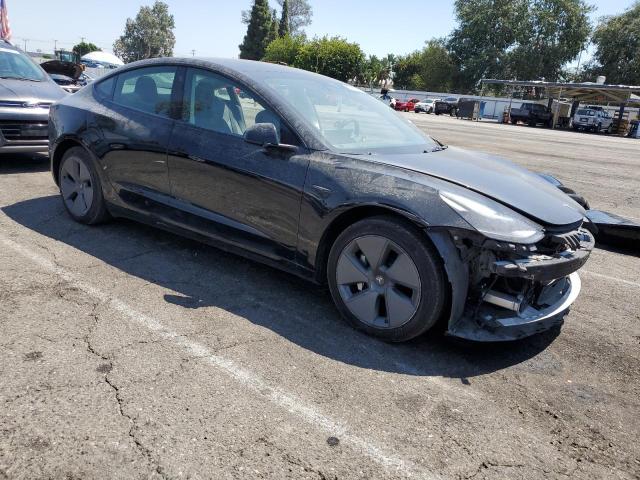 5YJ3E1EA1PF431500 - 2023 TESLA MODEL 3 Schwarz Foto 4