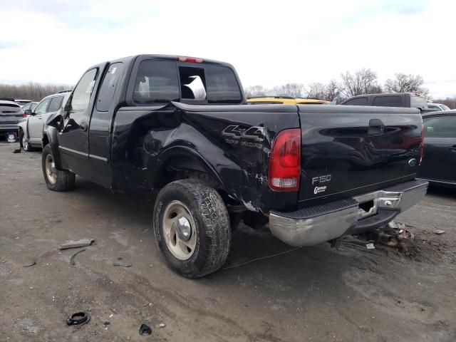 1FTRX18LXYNB43995 - 2000 FORD 150 BLACK photo 2