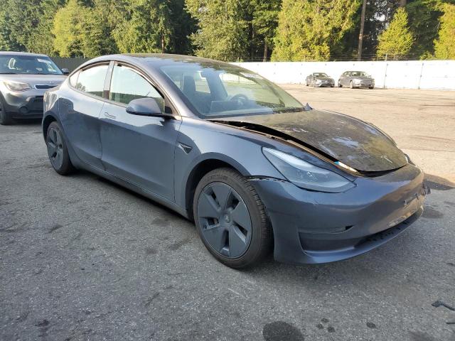 5YJ3E1EA2PF406377 - 2023 TESLA MODEL 3 GRAY photo 4