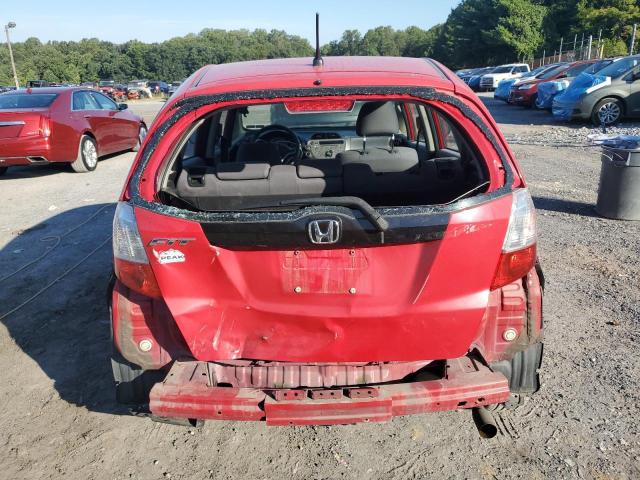 JHMGE8G3XCC031353 - 2012 HONDA FIT RED photo 6