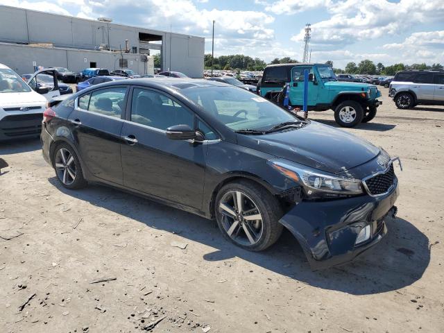 3KPFN4A80HE123159 - 2017 KIA FORTE EX BLACK photo 4