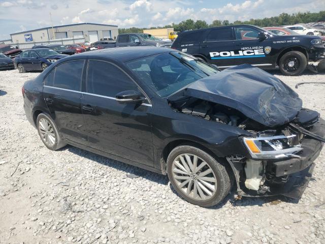 3VWLX7AJ9BM034959 - 2011 VOLKSWAGEN JETTA SEL BLACK photo 4