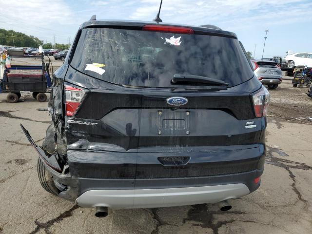 1FMCU0HD7JUA20549 - 2018 FORD ESCAPE SEL Schwarz Foto 6