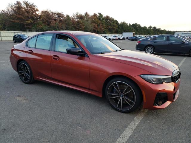 3MW5U9J06N8C34554 - 2022 BMW M340XI ORANGE photo 4