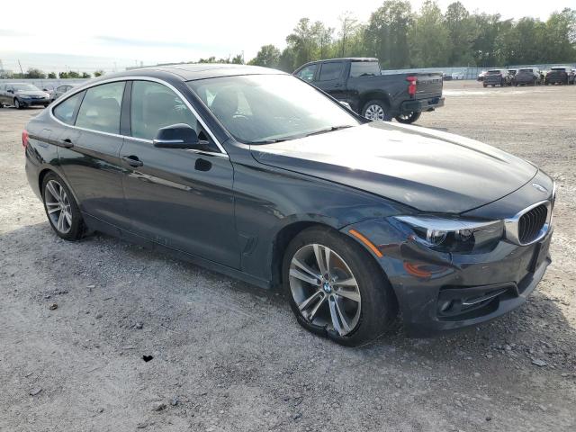 WBA8Z9C53JG827811 - 2018 BMW 330 XIGT BLACK photo 4