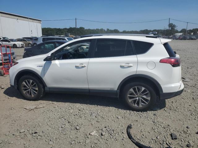 JTMRJREV6JD208049 - 2018 TOYOTA RAV4 HV LE WHITE photo 2