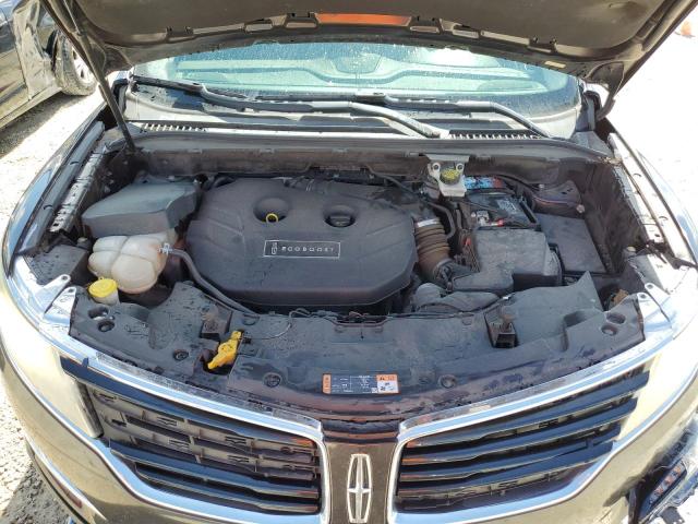 5LMCJ4C98GUJ12763 - 2016 LINCOLN MKC BLACK LABEL Braun Foto 12