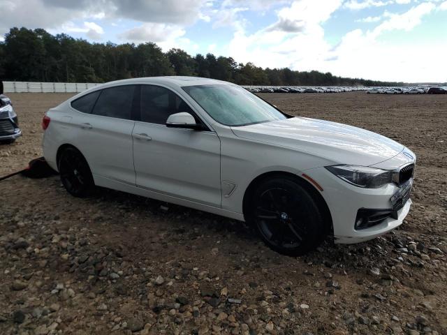 WBA8Z9C37HG827125 - 2017 BMW 330 XIGT WHITE photo 4