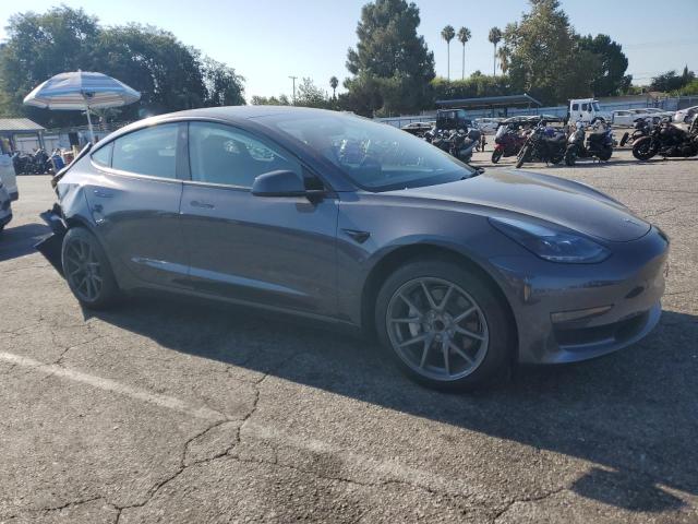 5YJ3E1EA2PF619653 - 2023 TESLA MODEL 3 ნაცრისფერი ფოტო 4