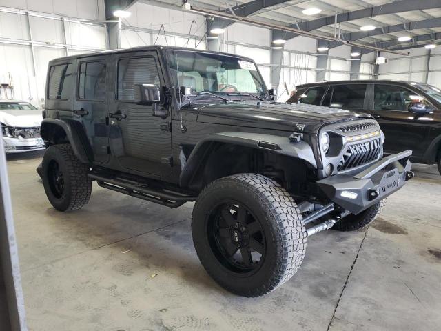 1J4GA59108L621845 - 2008 JEEP WRANGLER U SAHARA BLACK photo 4