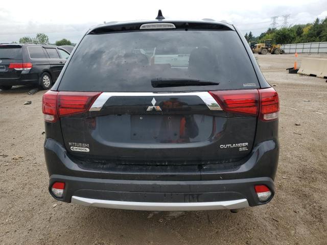 JA4AZ3A32JJ001466 - 2018 MITSUBISHI OUTLANDER SE BLACK photo 6