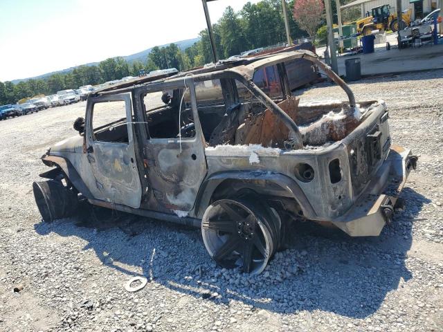 1J4BA3H10BL620928 - 2011 JEEP WRANGLER U SPORT Verbrannt Foto 2