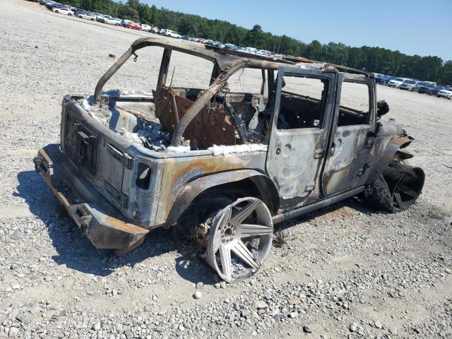 1J4BA3H10BL620928 - 2011 JEEP WRANGLER U SPORT Verbrannt Foto 3