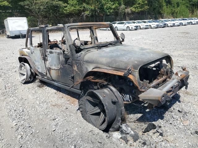 1J4BA3H10BL620928 - 2011 JEEP WRANGLER U SPORT Verbrannt Foto 4