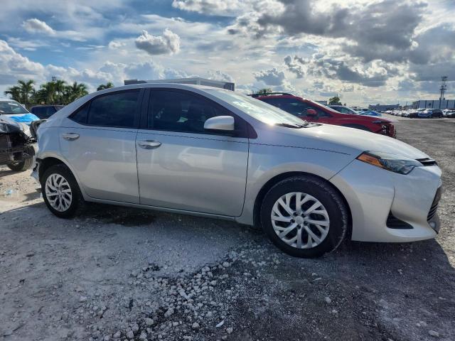 5YFBURHE6KP947294 - 2019 TOYOTA COROLLA L SILVER photo 4