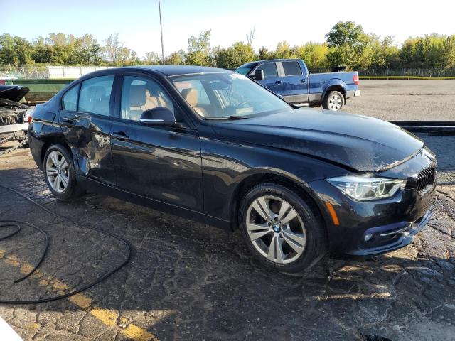 WBA8D9G58JNU69349 - 2018 BMW 330 XI BLACK photo 4