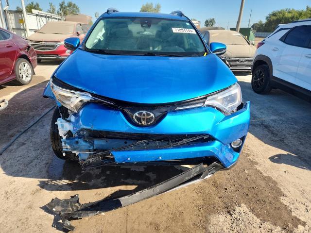 JTMYFREV8JJ212683 - 2018 TOYOTA RAV4 LIMITED BLUE photo 5