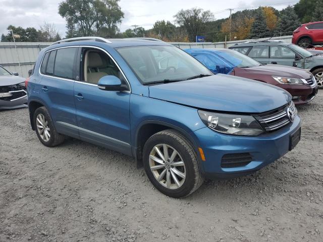 WVGSV7AX5HW512064 - 2017 VOLKSWAGEN TIGUAN WOLFSBURG BLUE photo 4