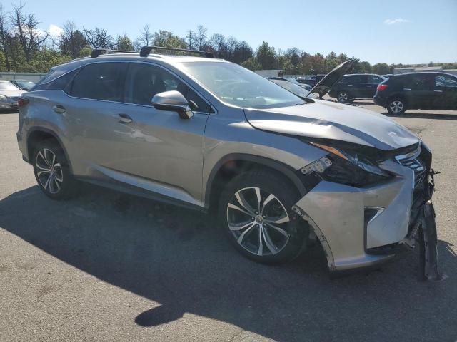 2T2BZMCA5HC100344 - 2017 LEXUS RX 350 BASE GRAY photo 4