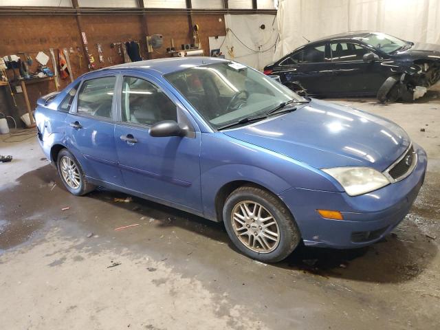 1FAHP34NX5W126561 - 2005 FORD FOCUS ZX4 BLUE photo 4