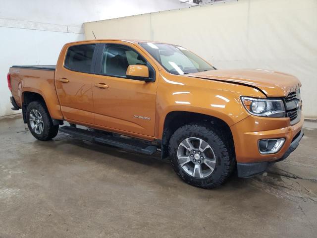 1GCGTDEN0H1291946 - 2017 CHEVROLET COLORADO Z71 ORANGE photo 4