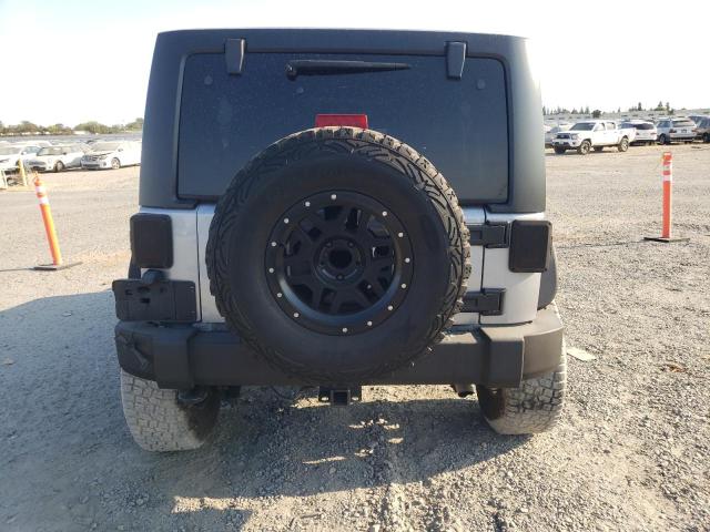 1C4BJWDG0JL805688 - 2018 JEEP WRANGLER U SPORT SILVER photo 6