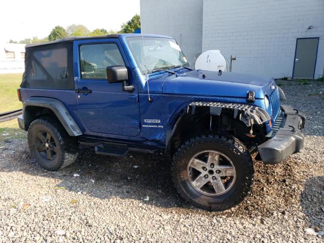 1J4AA2D12AL112356 - 2010 JEEP WRANGLER SPORT BLUE photo 4