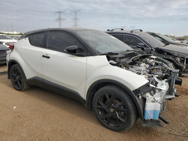 JTNKHMBX9M1112441 - 2021 TOYOTA C-HR XLE WHITE photo 4