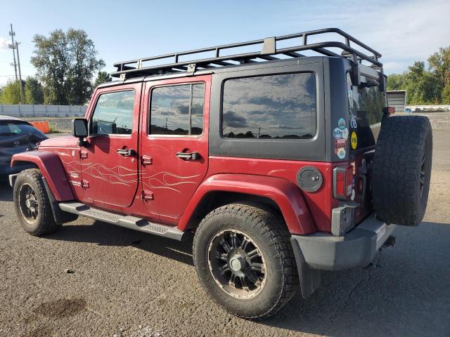 1J4BA5H17BL593450 - 2011 JEEP WRANGLER U SAHARA წითელი ფოტო 2