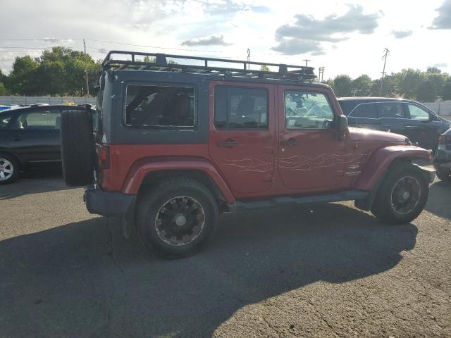 1J4BA5H17BL593450 - 2011 JEEP WRANGLER U SAHARA წითელი ფოტო 3