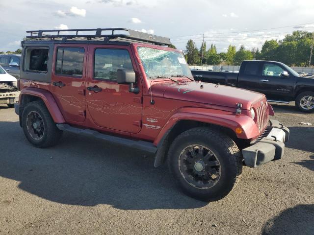 1J4BA5H17BL593450 - 2011 JEEP WRANGLER U SAHARA წითელი ფოტო 4