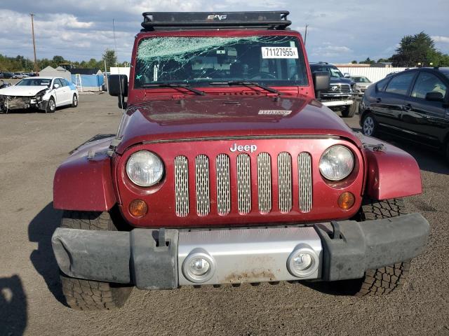 1J4BA5H17BL593450 - 2011 JEEP WRANGLER U SAHARA წითელი ფოტო 5